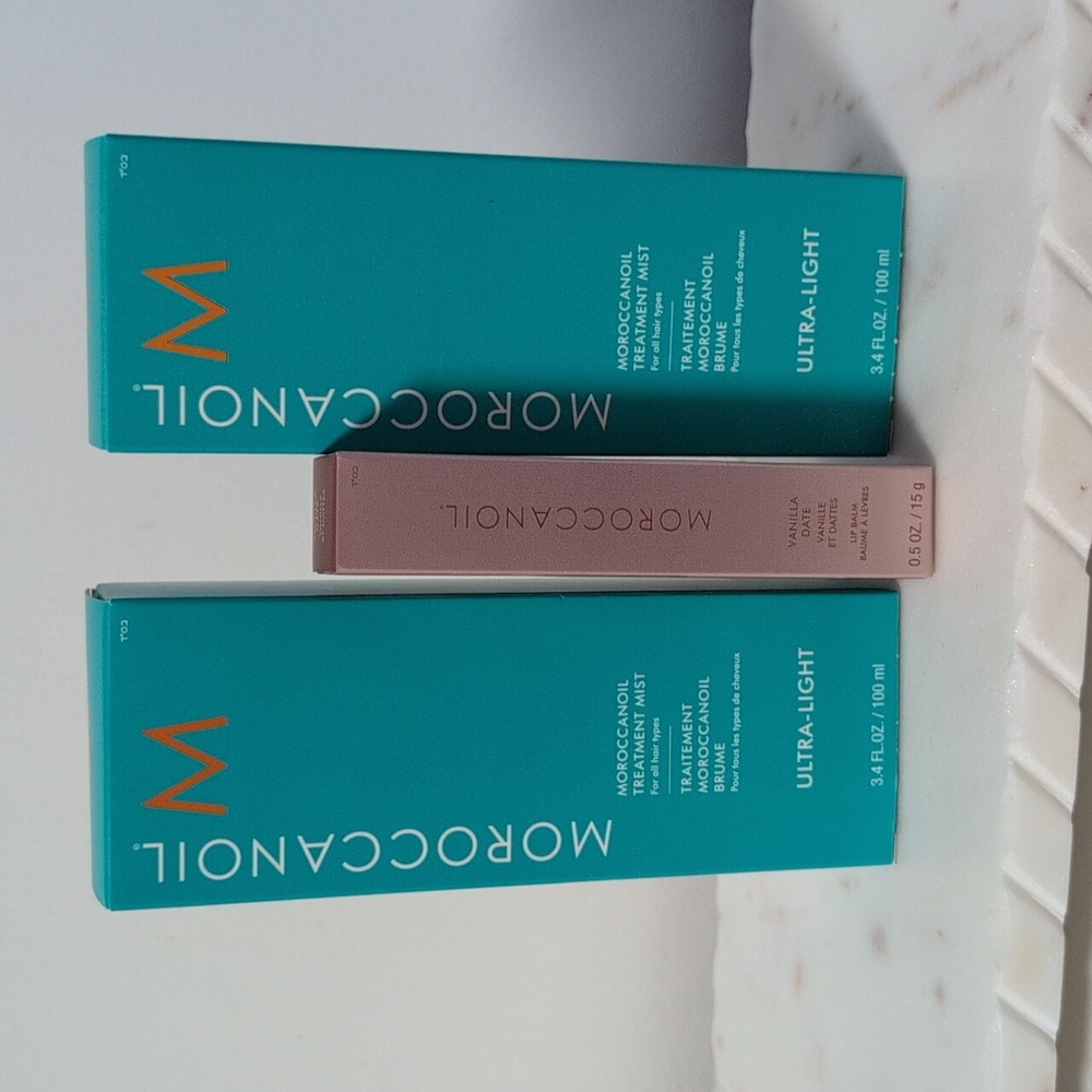 Two Moroccanoil Ultra-Light Treatment Mist in Teal With Vanilla Date Lip Balm